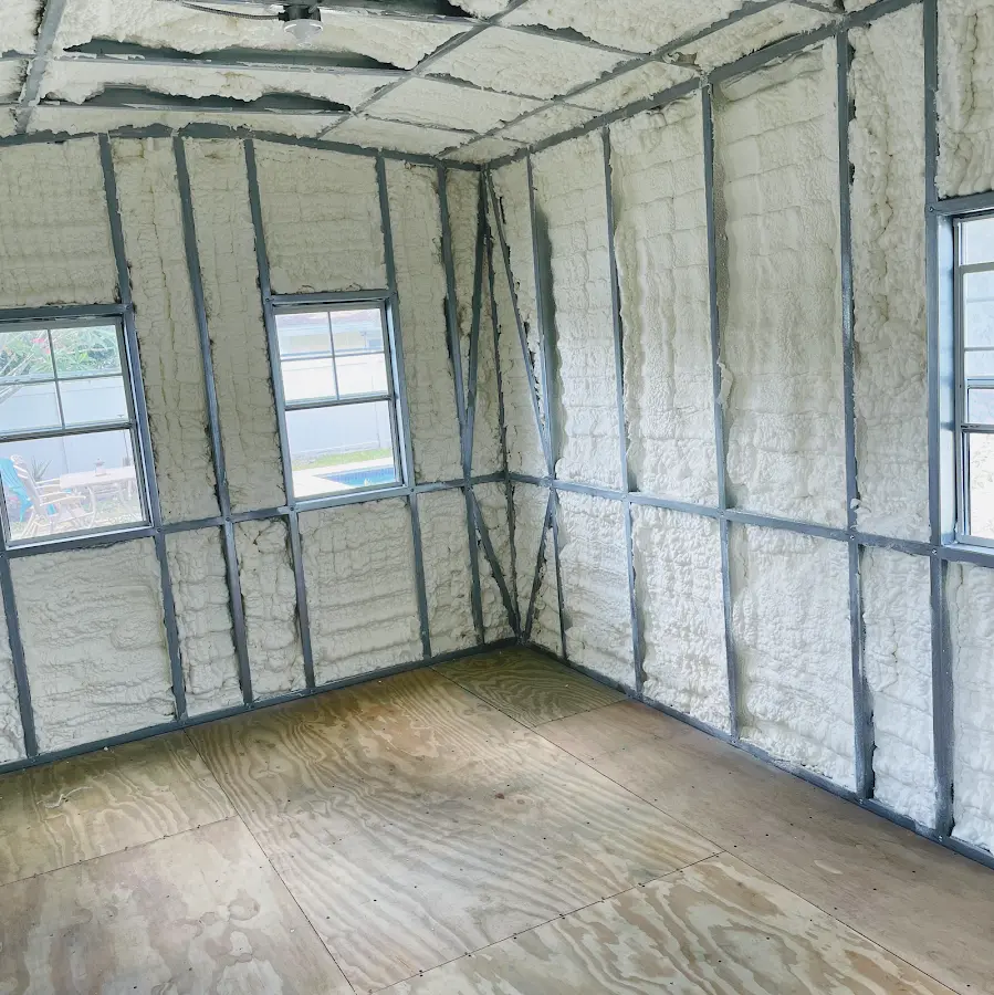 Closed-cell spray foam insulation applied to wall cavities in a residential project in East Hampton